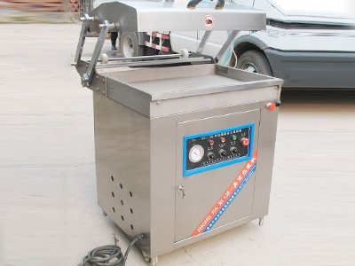 Single chamber vacuum packaging machine